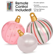 Decorative Christmas ornaments with remote control and color options on a white background